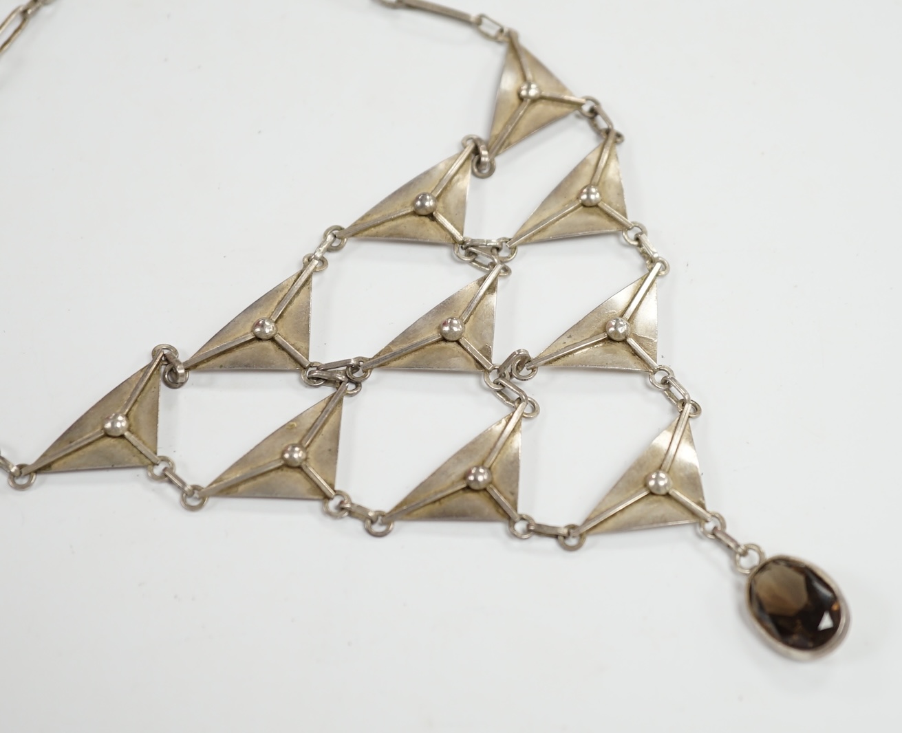 A stylish Polish white metal and single stone oval cut smoky quartz set drop choker necklace, makers mark, ON over NO?, 42cm. Condition - fair